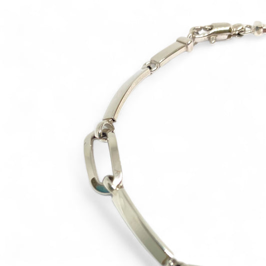 Pulsera semirígida de Oro Blanco de 18kt con detalle de 3 eslabones. Cierre mosquetón. Medida cadena: 19cm. Joyería Ian'or, donde comprar y vender oro al mejor precio.
