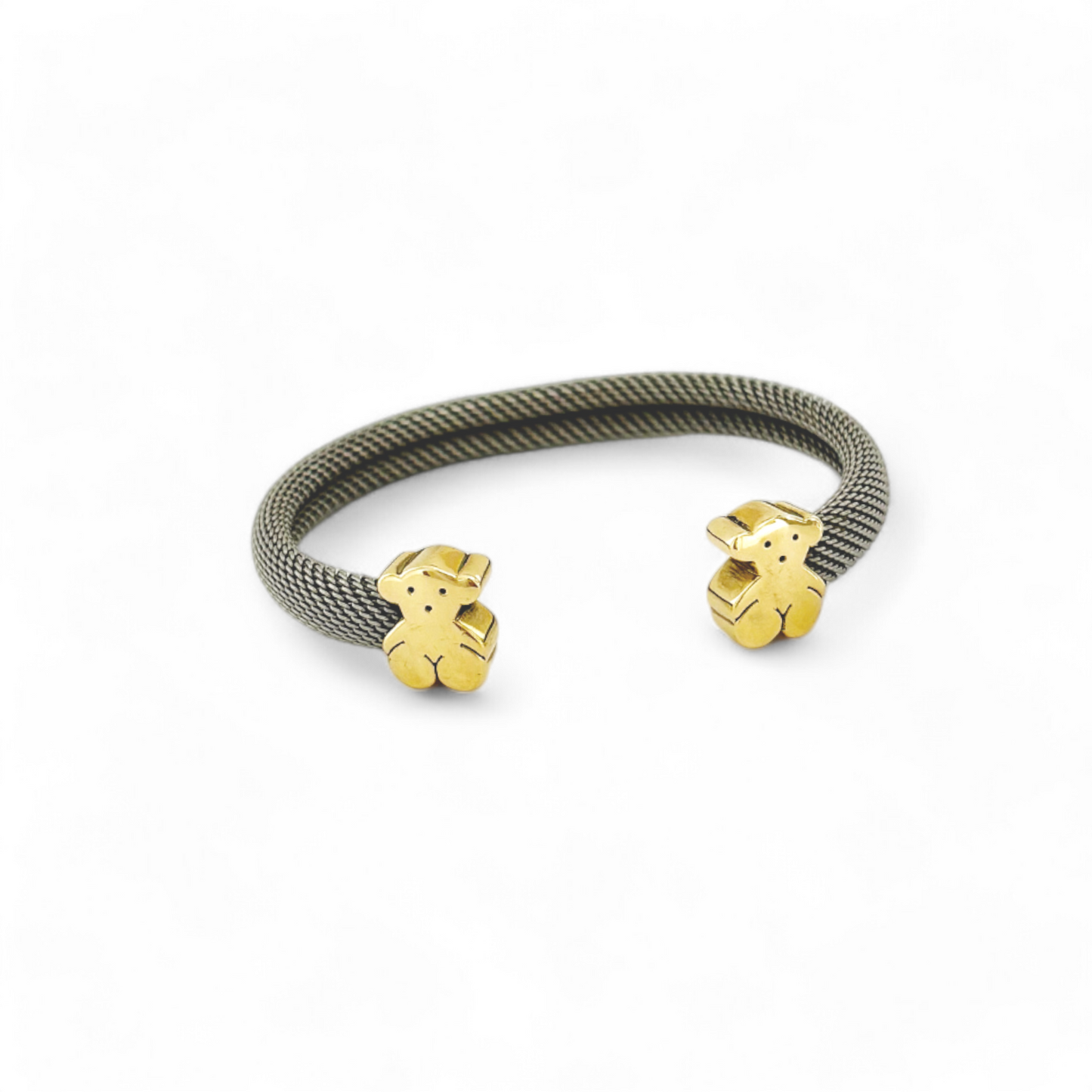 Esta icónica pulsera de Tous está realizada en acero y oro amarillo de 18k. La esclava está realizada con el tejido característico de malla en acero y los detalles del oso en oro amarillo de 18k. Joyas de segunda mano en Barcelona, compro oro y joyas al mejor precio. Joyería Compro Oro Barcelona, el mejor precio por tu oro y por joyas de segunda mano