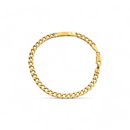 Pulsera oro de 18kt con cadena tipo cubana de oro de 18kt con una placa situada en un lateral que lo convierte en un no me olvides sofisticado. La cadena mide 19cm y tiene 4mm de grosor. Joyería Ian'or, dónde comprar y vender oro al mejor precio en Barcelona. Joyas de segunda mano y restauradas en Barcelona.
