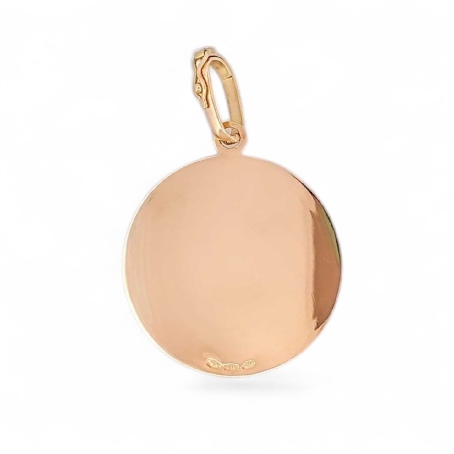 Colgante medalla con el signo del Zodiaco de Capricornio realizada de oro amarillo de 18kt . La medalla hace 134mm de diámetro y la balía dispone de cierre de seguridad y mide de 12mm