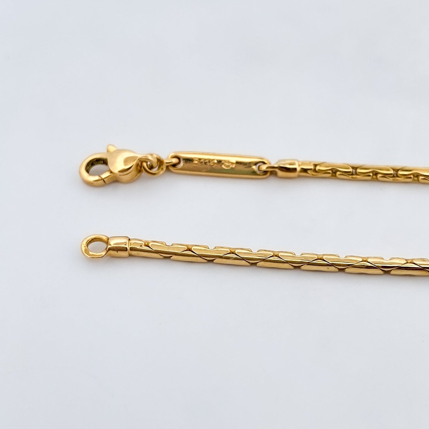Comprar cadena tipo cordón semirrígido de oro amarillo de 18kt, de 43cm con cierre tipo mosquetón. Envío GRATIS. Cadenas de oro baratas.