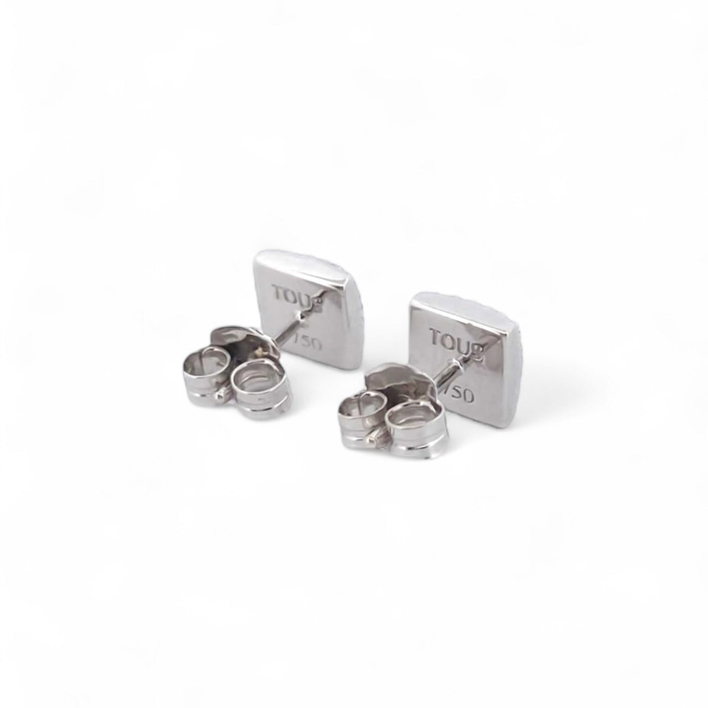 Comprar pendientes realizados en oro blanco de 18kt originales de la firma TOUS con ónix guardado y diamantes talla brillante alrededor. Joyas Tous restauradas.