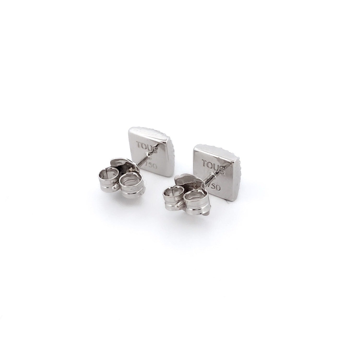 Comprar pendientes realizados en oro blanco de 18kt originales de la firma TOUS con ónix guardado y diamantes talla brillante alrededor. Joyas Tous restauradas.