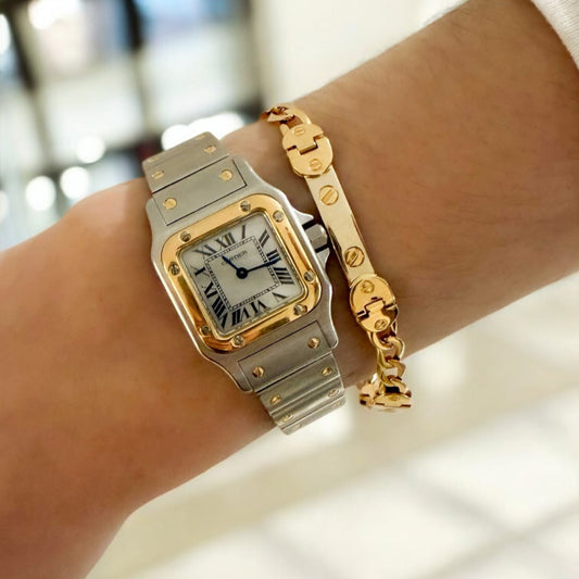 Reloj de quarzo vintage Cartier modelo Santos Galbée de mujer realizado en Acero y Oro de 18kt.
Relojes Cartier de segunda mano baratos en Barcelona.