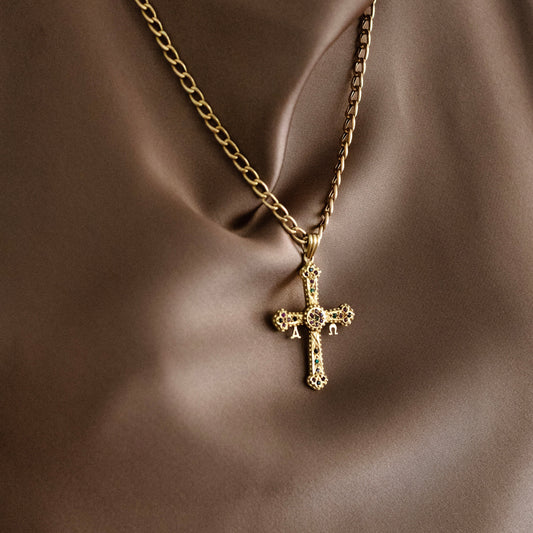 Comprar colgante cruz Asturiana en oro amarillo de 18kt con 28 piedras de colores. Joyería Ian'Or. Joyas acondicionadas para una nueva vida. Envío gratis.