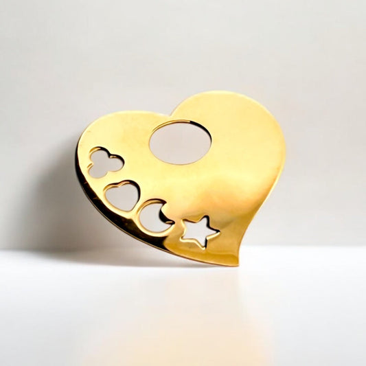 Comprar colgante en forma de corazón liso realizado en oro amarillo de 18kt. Con forma de estrella, luna, corazón y flor. Envío gratis. Joyería Ian'Or.