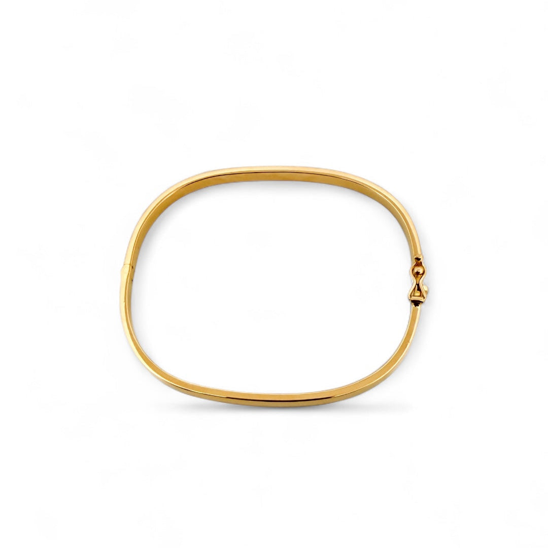 Comprar pulsera en forma rectangular realizada en oro amarillo de 18kt. Esta pulsera rígida dispone de cierre de cajón y brazo de seguridad. Joyas segunda mano.