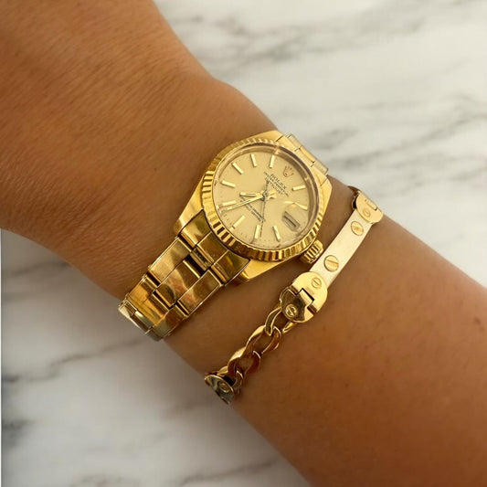 Reloj Rolex Datejust de Mujer caja de 26mm. Realizado en oro amarillo de 18kt.
Medida correa: 19cm, correa oyster. Rolex de segunda mano baratos en Barcelona.