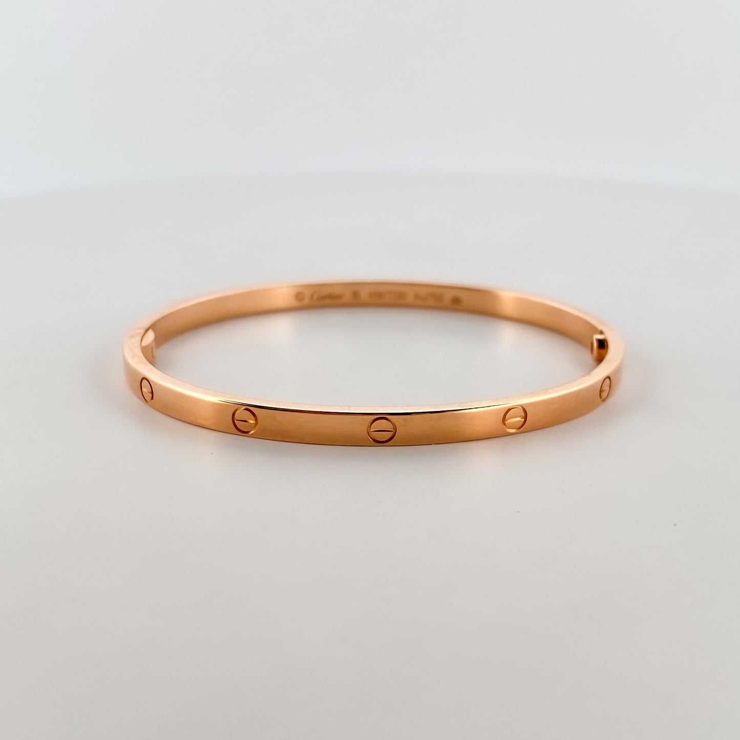 Comprar pulsera esclava de la prestigiosa firma Cartier realizada en oro rosa de 18kt. Joyas Cartier baratas. Joyería Ian'Or. Envío GRATIS.