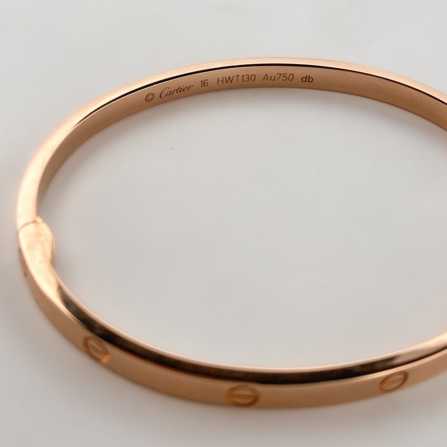 Comprar pulsera esclava de la prestigiosa firma Cartier realizada en oro rosa de 18kt. Joyas Cartier baratas. Joyería Ian'Or. Envío GRATIS.