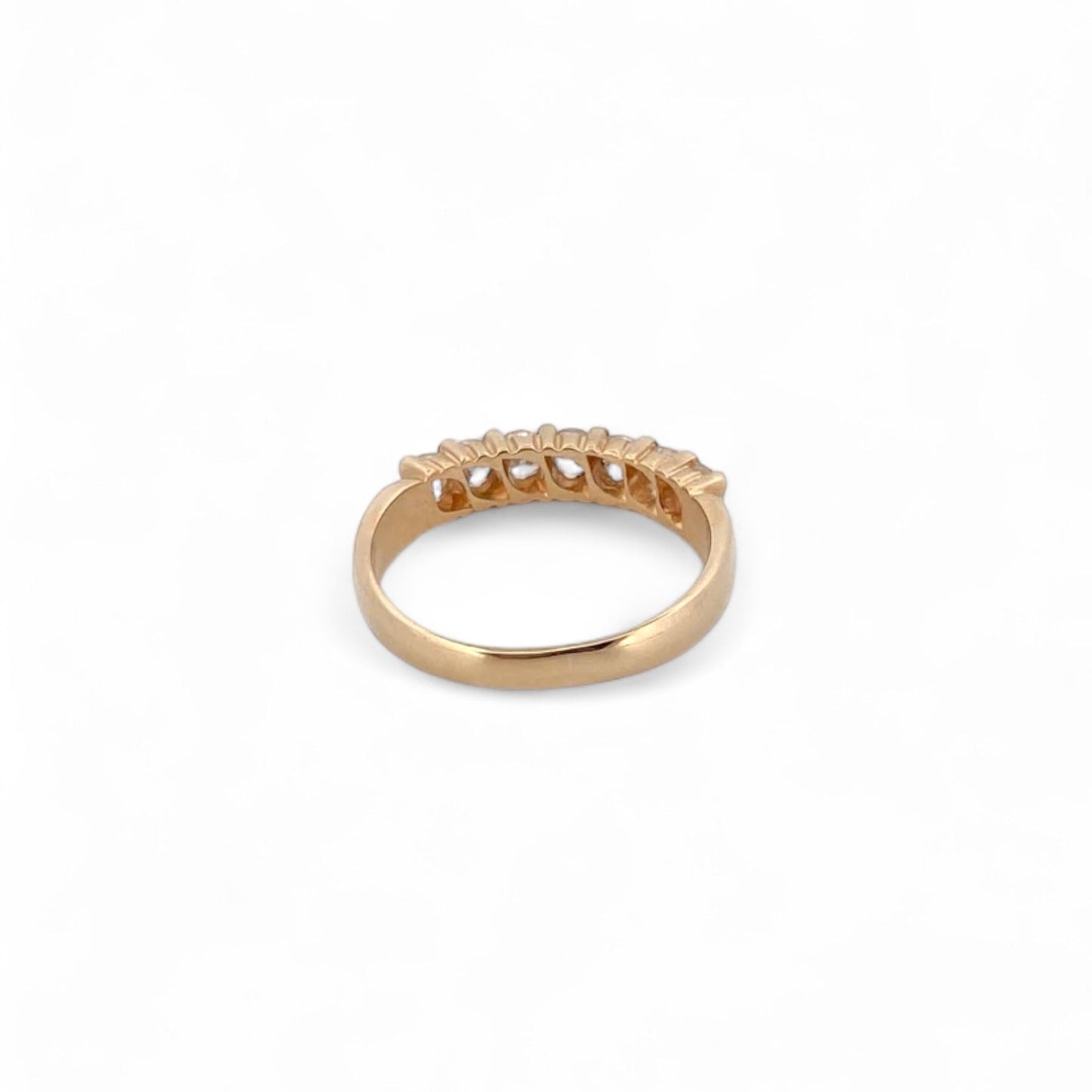 Comprar media alianza de oro amarillo de 18kt con 7 brillantes engastados en grapas. Joyas de segunda mano. Envío GRATIS. Anillos de compromiso baratos.