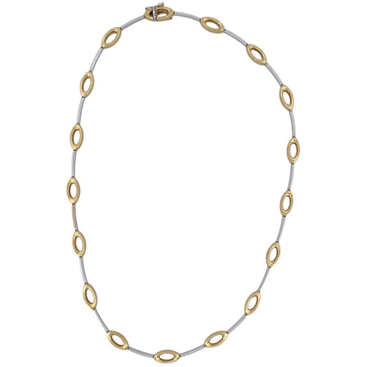 Comprar collar semirrígido realizado en oro blanco y amarillo de 18kt. Cierre de cajón y un brazo de seguridad. Joyería Compro Oro Barcelona. Ian'Or.