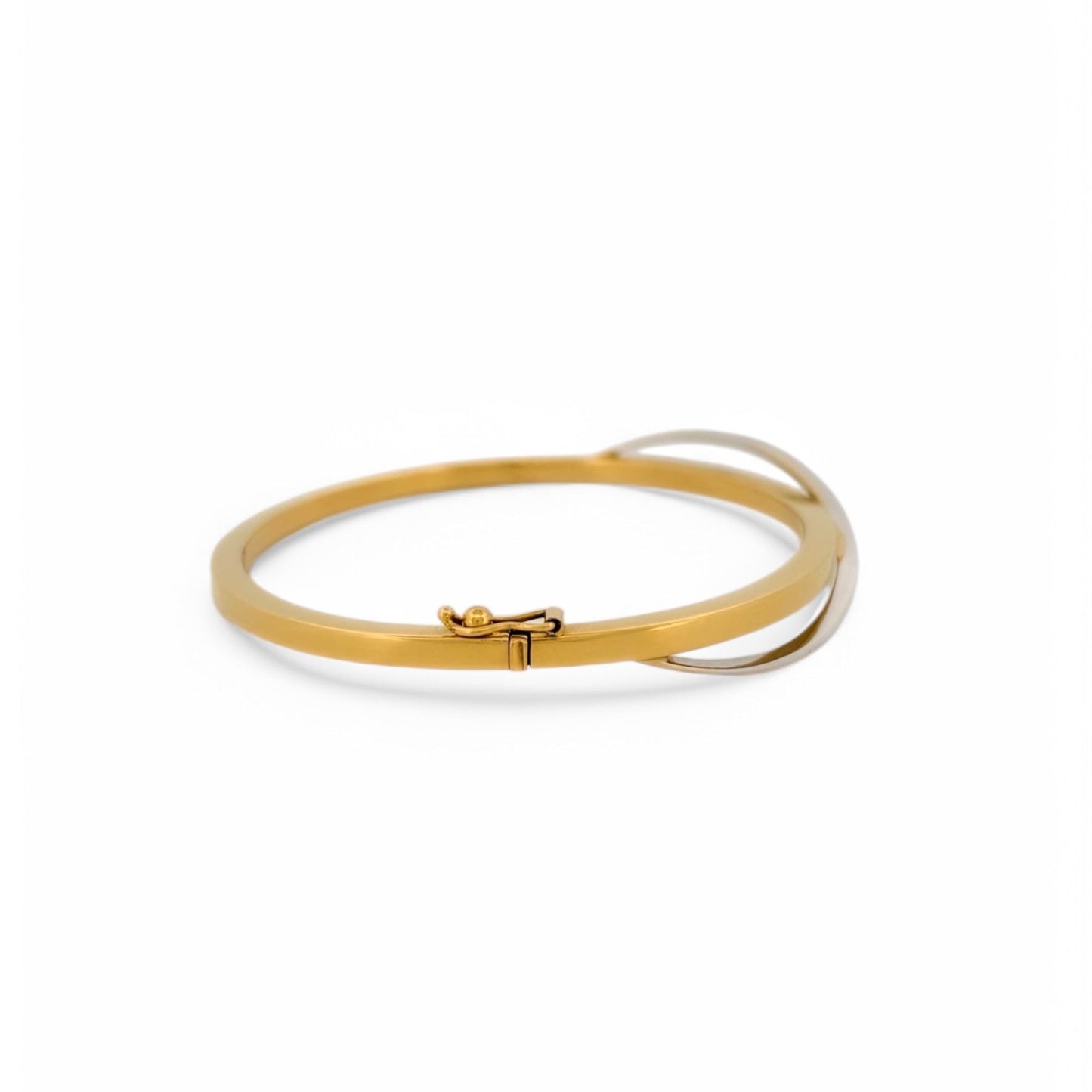 Comprar pulsera esclava de Oro amarillo de 18kt. Esta preciosa pulsera rígida dispone de cierre de cajón. Joyas de segunda mano en Barcelona. Joyería Ian'Or.