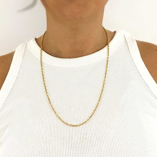 Collar de oro amarillo de 18kt con cadena forzada de eslabones con un cierre tipo mosquetón. La cadena mide 62,5cm. Cadenas de oro de 18kt baratas. Envío gratis