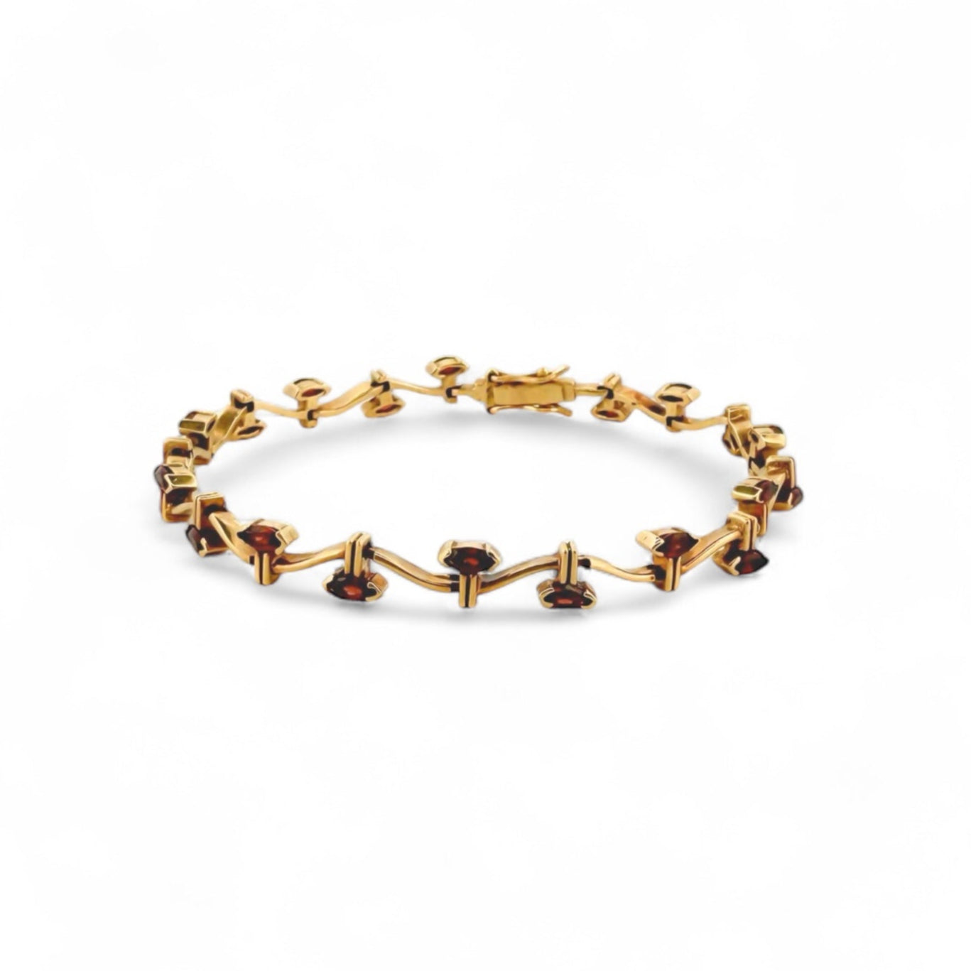 Comprar pulsera oro amarillo de 18kt con 20 rubíes talla oval a lo largo de la pulsera. Compra de joyas al mejor precio en Barcelona. Joyería Ian'Or.