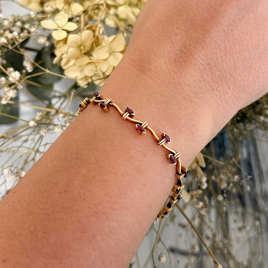 Comprar pulsera oro amarillo de 18kt con 20 rubíes talla oval a lo largo de la pulsera. Compra de joyas al mejor precio en Barcelona. Joyería Ian'Or.