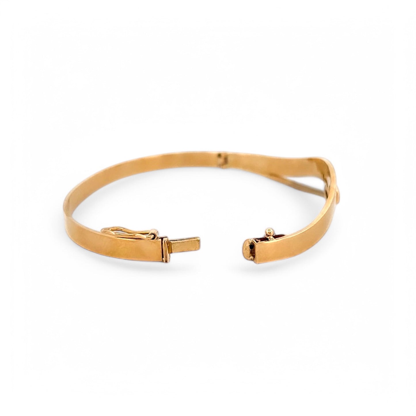 Pulsera esclava de Oro amarillo de 18kt y un diamante talla brillante. Esta preciosa pulsera rígida dispone de cierre de cajón. Joyas de segunda mano en Barcelona, compro oro y joyas al mejor precio. Joyería Compro Oro Barcelona, el mejor precio por tu oro y por joyas de segunda mano.