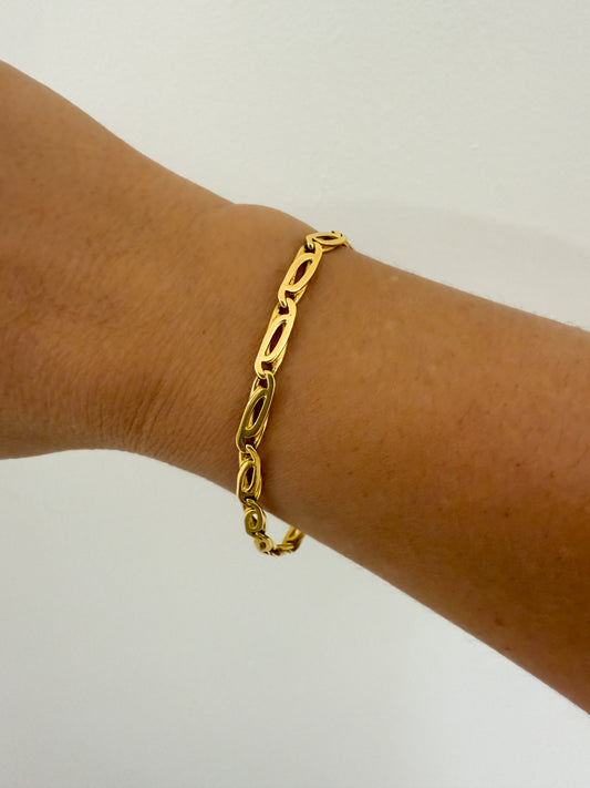 Pulsera oro amarillo de 18kt con cadena eslabones tipo ojo de tigre. La pulsera mide 19,5cm Pulseras de oro 18kt al mejor precio en Barcelona.