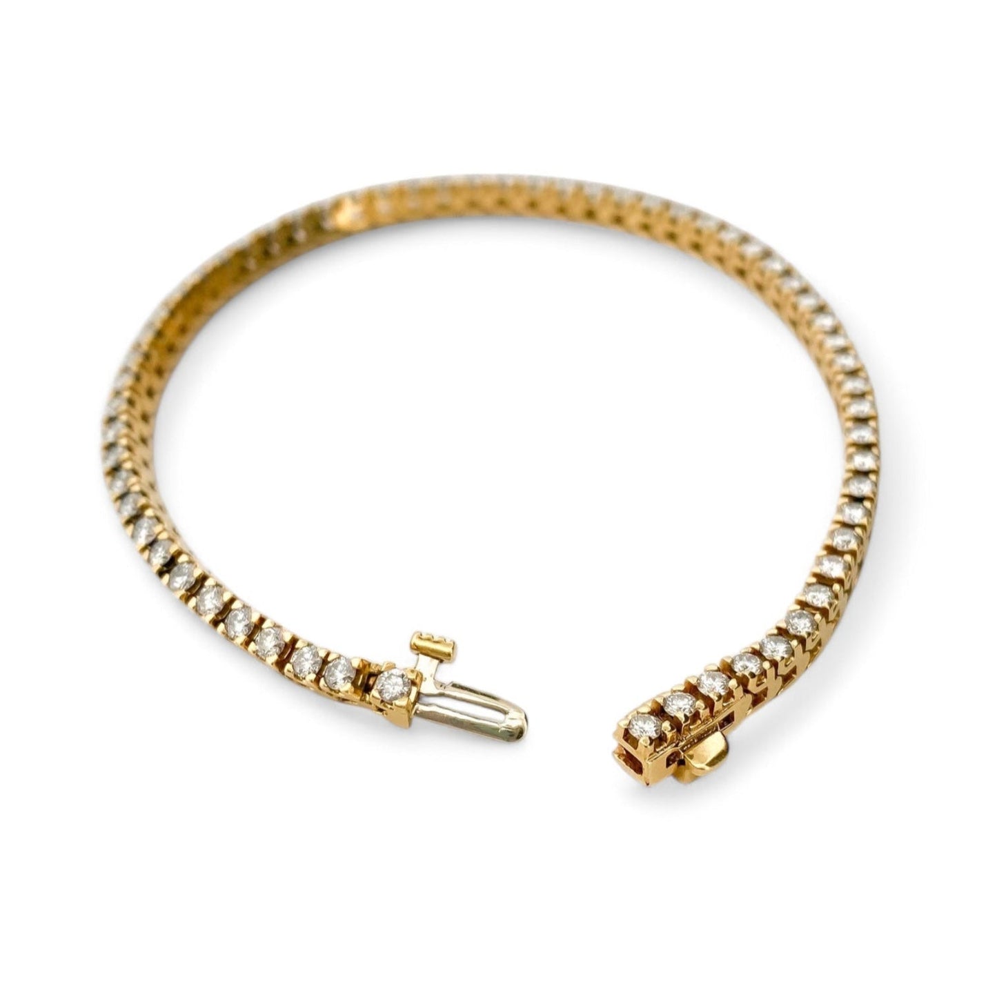 Pulsera riviere de oro amarillo de 18kt con diamantes. Pulseras Riviere baratas en Barcelona. Joyas de segunda mano. Joyas con diamantes. Envío gratis.