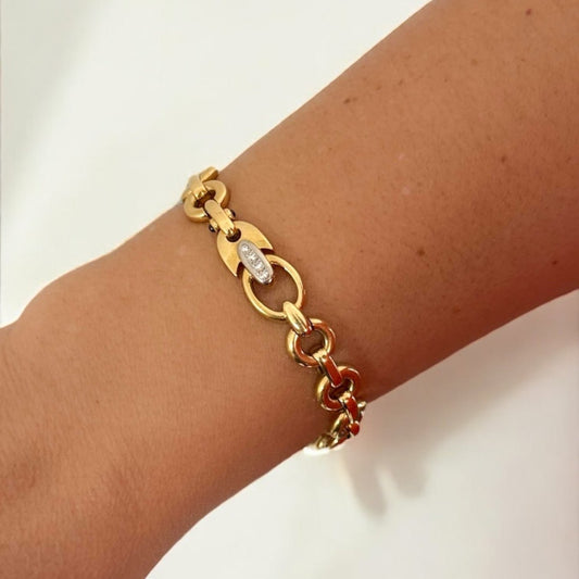 Pulsera oro amarillo de 18kt con cadena rolo hueca. La pulsera mide 20cm y 10,37mm de grosor. Compra de joyas masculinas al mejor precio en Barcelona.