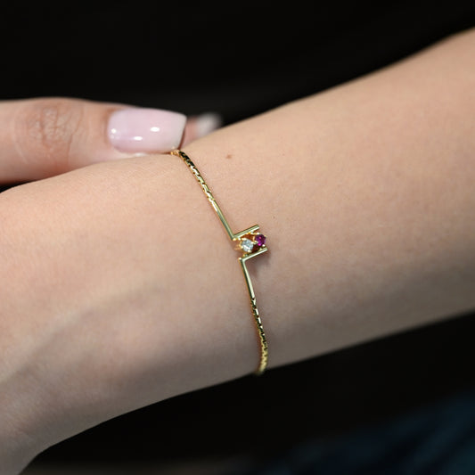 Comprar pulsera de oro amarillo de 18kt con 1 diamante y 1 rubí. Joyería Compro Oro Barcelona. Joyas de segunda mano. Envío gratis.
