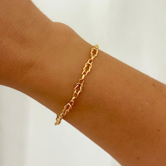 Comprar pulsera oro amarillo de 18kt con cadena nudo marinero. Compra de joyas masculinas al mejor precio en Barcelona. Joyas de segunda mano. Joyería Ian'Or.