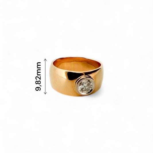 Comprar anillo ancho realizado en oro amarillo de 18kt con un diamante talla brillante de 0,25ct. Anillos de segunda mano. Joyería Ian'Or. Envío gratis.