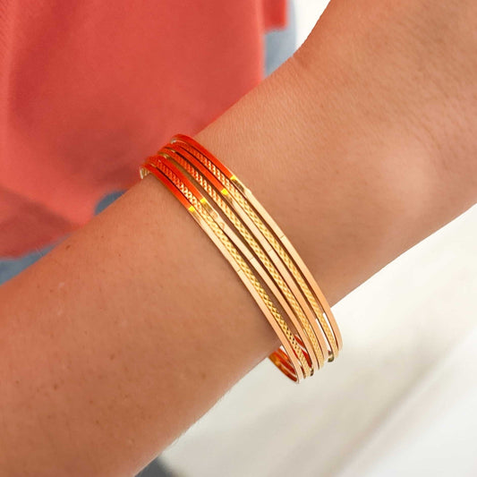 Comprar pulsera realizada en oro amarillo de 18kt con siete bandas unidas. Compra de joyas al mejor precio en Barcelona. Joyería Ian'Or. Envío gratis.