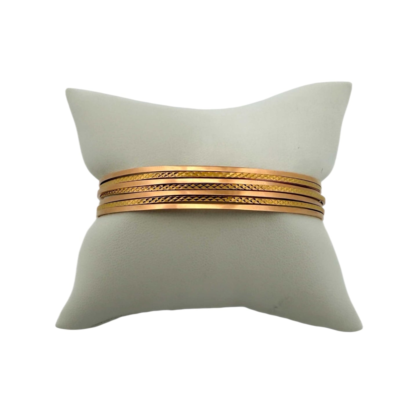 Comprar pulsera realizada en oro amarillo de 18kt con siete bandas unidas. Compra de joyas al mejor precio en Barcelona. Joyería Ian'Or. Envío gratis.