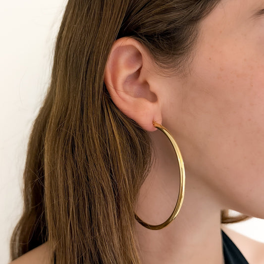 Comprar pendientes aro lisos en oro amarillo de 18kt de 66mm de diámetro y 3,03mm de grosor. Cierre tipo criolla. Joyería Ian'Or. Envío GRATIS. Ian'Or.