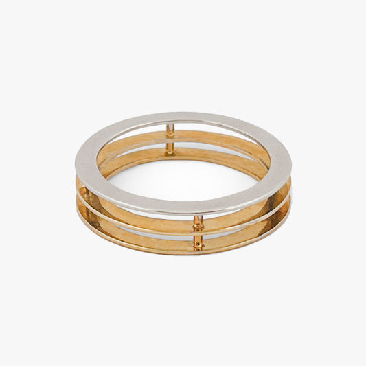 Comprar anillo de tres aros, dos de ellos realizado en oro amarillo de 18kt y el otro realizado en oro blanco. Joyeria Ian Or.
