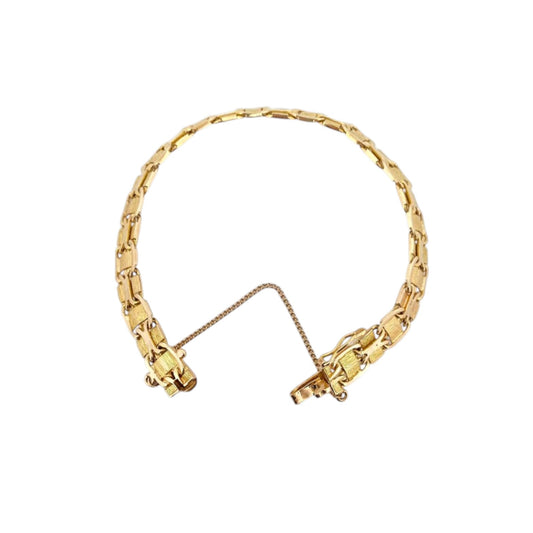 Comprar Pulsera oro amarillo de 18kt con malla semirrígida. La pulsera mide 17,3cm y dispone de cierre tipo cajón. Pulseras oro 18kt al mejor precio. Ian'Or.