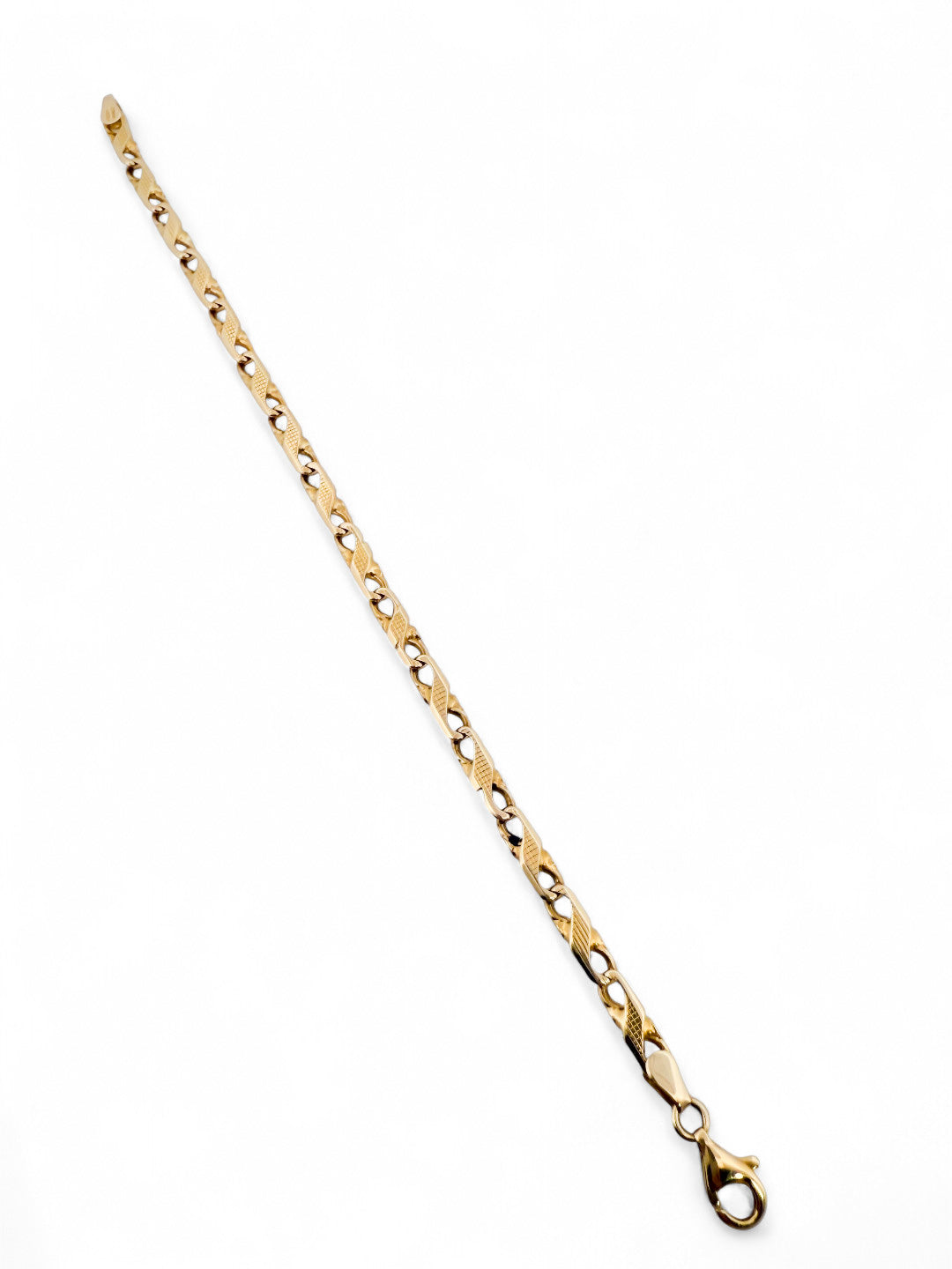 Pulsera oro amarillo de 18kt con eslabones en forma de infinito. Cierre tipo mosquetón.. Comprar pulseras de oro al mejor precio en Barcelona