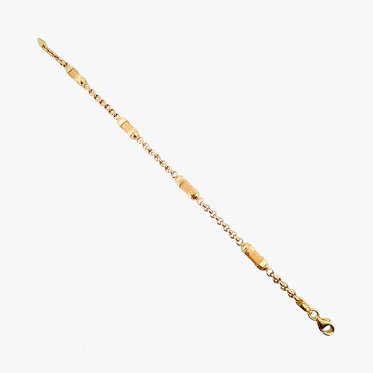 Pulsera oro amarillo de 18kt con cadena tipo rolo y 4 barriles alternos. La pulsera mide 20cm y 4,80mm de grosor. Pieza certificada y envío gratuito