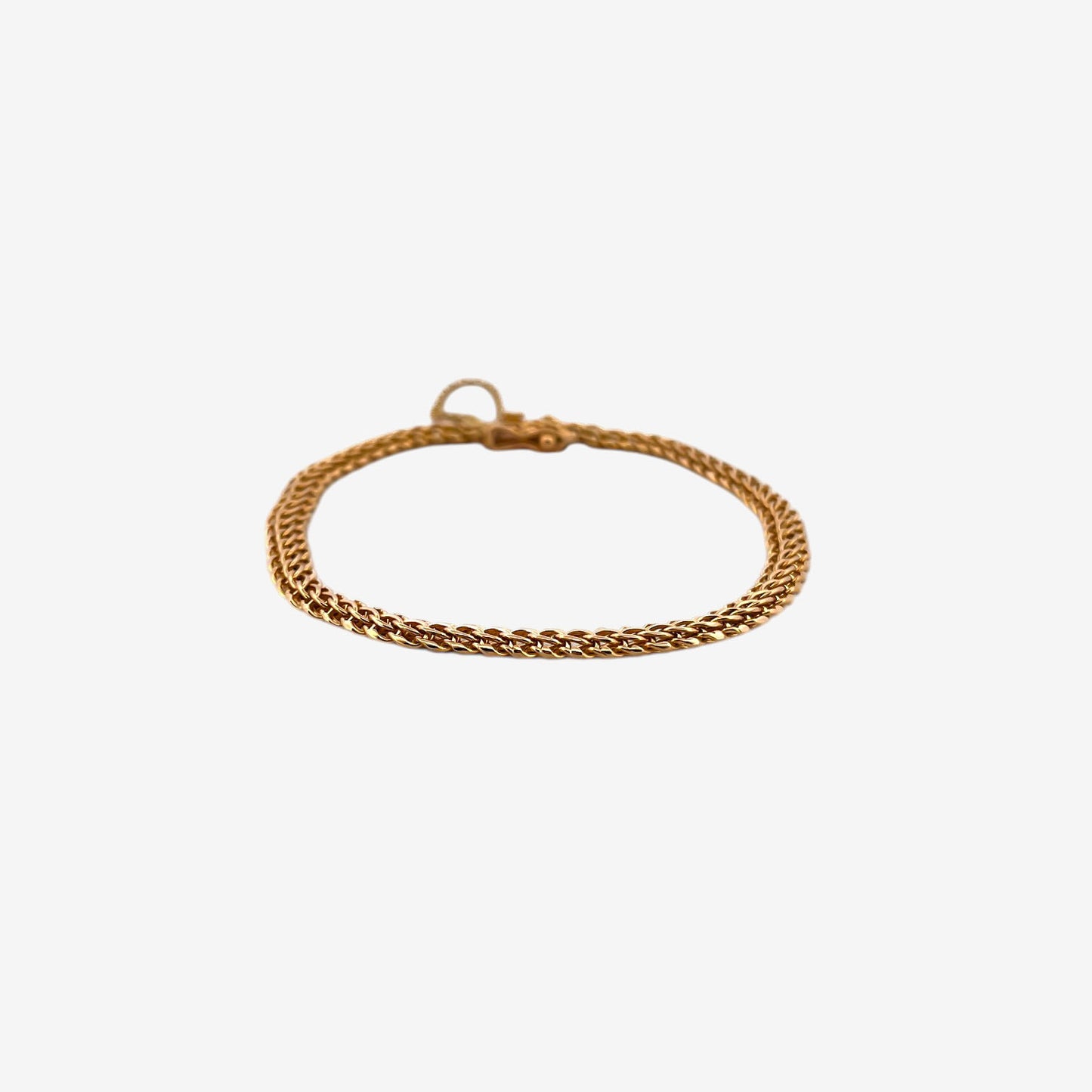 Comprar pulsera oro amarillo de 18kt con cadena tipo bizantina. La pulsera mide 20cm y dispone de cierre tipo cajón y brazo y cadena de seguridad. Pulseras oro 18kt al mejor precio. Ian'Or.