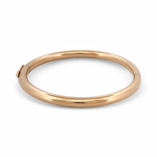 Pulsera vintage esclava de Oro amarillo de 18kt. Esta preciosa pulsera rígida dispone de un cierre de cajón. Joyas de segunda mano en Barcelona. Joyas baratas.