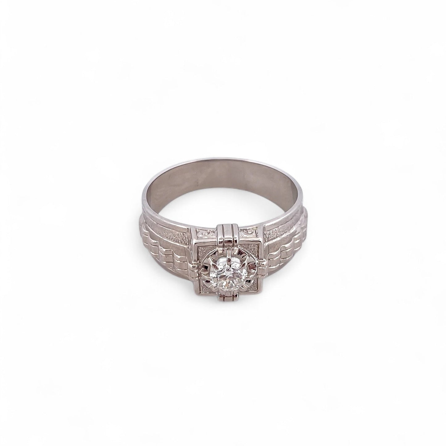 Comprar sortija realizada en oro blanco de 18kt con diamante central de 0,5 quilates engastado en 8 grapas. Joyas con diamantes. Joyería Ian'Or. Envío gratis.