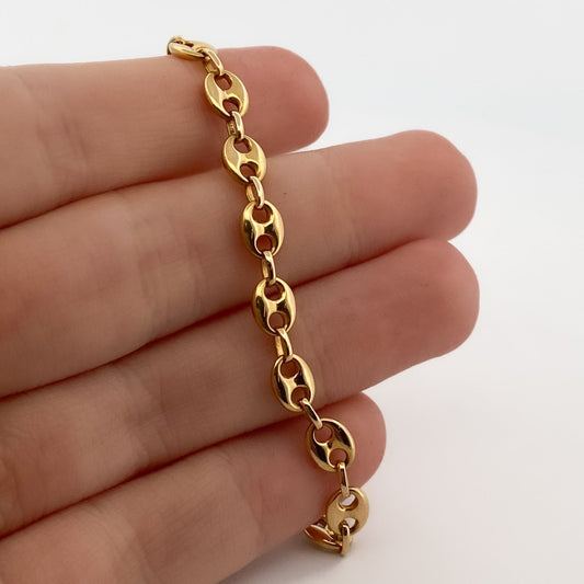 Collar de oro amarillo de 18kt de cadena de calabrote. La cadena mide 61,5cm de largo y tiene un grosor de 5,46mm. Dispone de un cierre tipo mosquetón. Ian'Or.