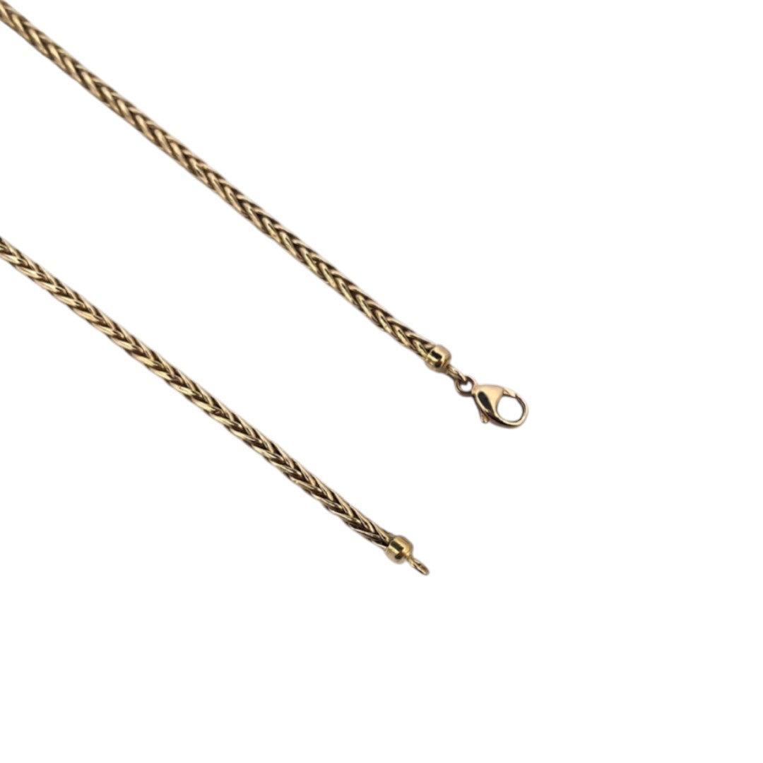 Comprar collar de oro amarillo de 18kt con cadena tipo espiga. Dispone de un cierre tipo mosquetón. Joyería Ian'or, dónde comprar y vender oro al mejor precio en Barcelona. Joyas de segunda mano y restauradas en Barcelona.