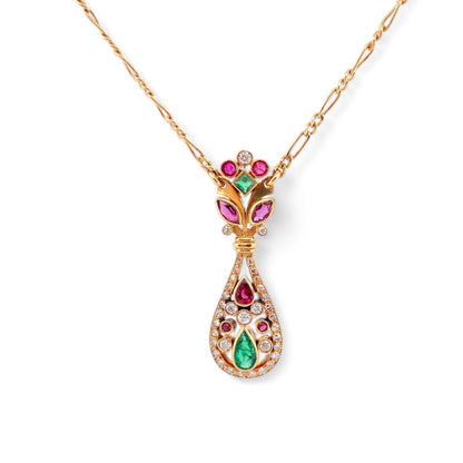 Collar vintage de oro amarillo de 18kt con cadena tipo barbada alterna y colgante antiguo en con formas florales y diamantes talla brillante rubíes y esmeraldas. Cierre tipo reasa. La cadena mide 50cm y el colgante 39,20mm de alto x 12mm de ancho.
Compra venta de joyas antiguas y vintage en Barcelona