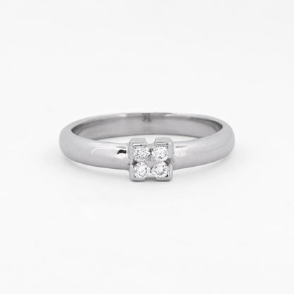 Anillo de oro blanco de 18kt con 4 diamantes engastados. Pieza de segunda mano y se entrega certificada. Envío gratis. Joyas baratas con diamantes. Envío gratis