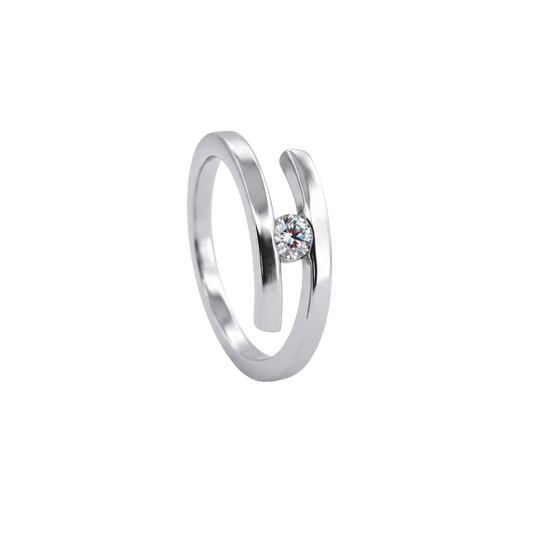 Solitario realizado en oro blanco de 18kt con diamante talla brillante engastado en los 2 brazos. Un anillo que destaca por su sencillez y comodidad. Compro Oro  y venta de joyas restauradas, dónde comprar y vende oro y joyas al mejor precio en Barcelona. Anillos de compromiso baratos en Barcelona.