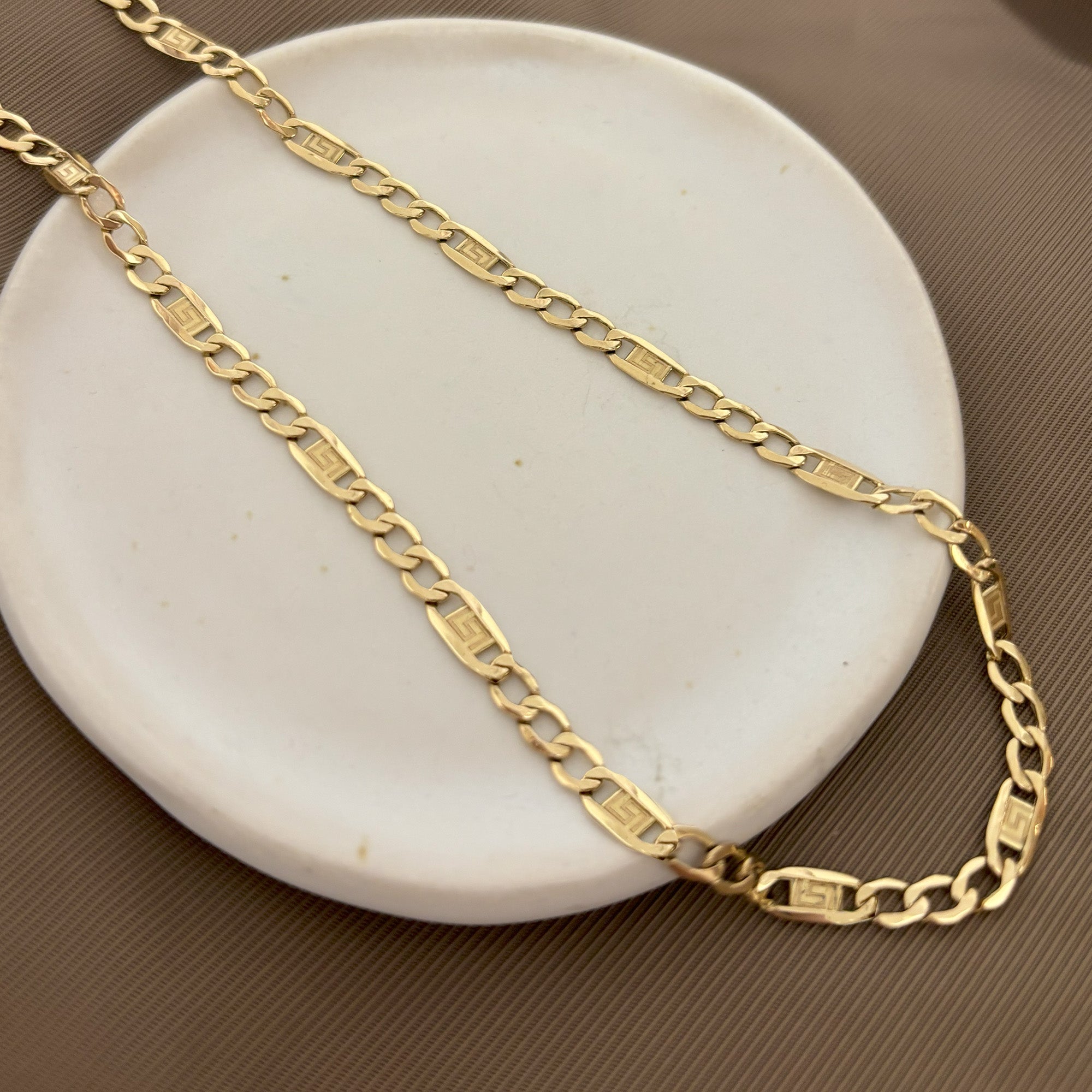 Collar de cadena alterna de 61 cm de oro amarillo de 18 kt y cierre de mosquetón.joyeria Ian'or, donde comprar y vender joyas al mejor precio en Barcelona