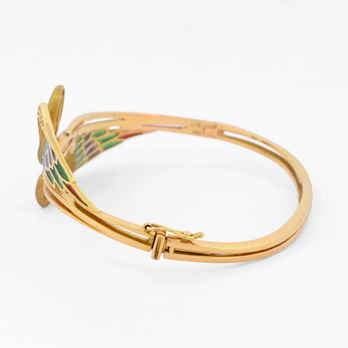 Espectacular pulsera de oro amarillo de 18kt tipo esclava con 2 cisnes que sujetan un diamante talla brillante. Joyas antiguas y vintage en Barcelona.