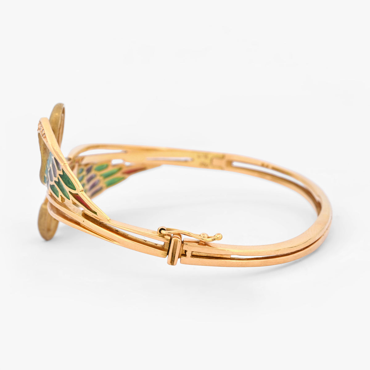 Espectacular pulsera de oro amarillo de 18kt tipo esclava con 2 cisnes que sujetan un diamante talla brillante. Joyas antiguas y vintage en Barcelona.