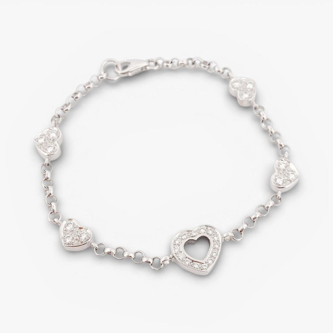 Pulsera de oro blanco de 18kt con cadena tipo rolo y diamantes alternos estilo Chopard. 
