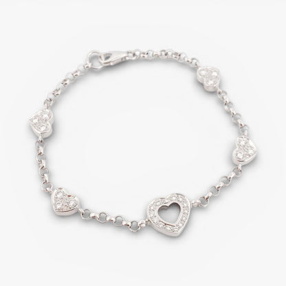 Pulsera de oro blanco de 18kt con cadena tipo rolo y diamantes alternos estilo Chopard. 
