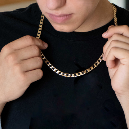 Collar de oro de 18kt con cadena barbada plana de 7mm de grosor. La cadena mide 61cm de largo y lleva cierre tipo cajón y cierre de seguridad lateral. Joya unisex para hombre y mujer.
Medida: 61cm largo y 0,7cm grosor
Peso: 48,46g.
Material: Oro de 18 Kt.
Cadenas de hombre  de oro de 18kt baratas