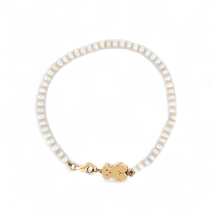 Comprar pulsera original de la firma TOUS con perlas cultivadas y oso sweet dolls en oro amarillo de 18kt. Pieza descatalogada. Pulseras Tous baratas. Ian'Or.