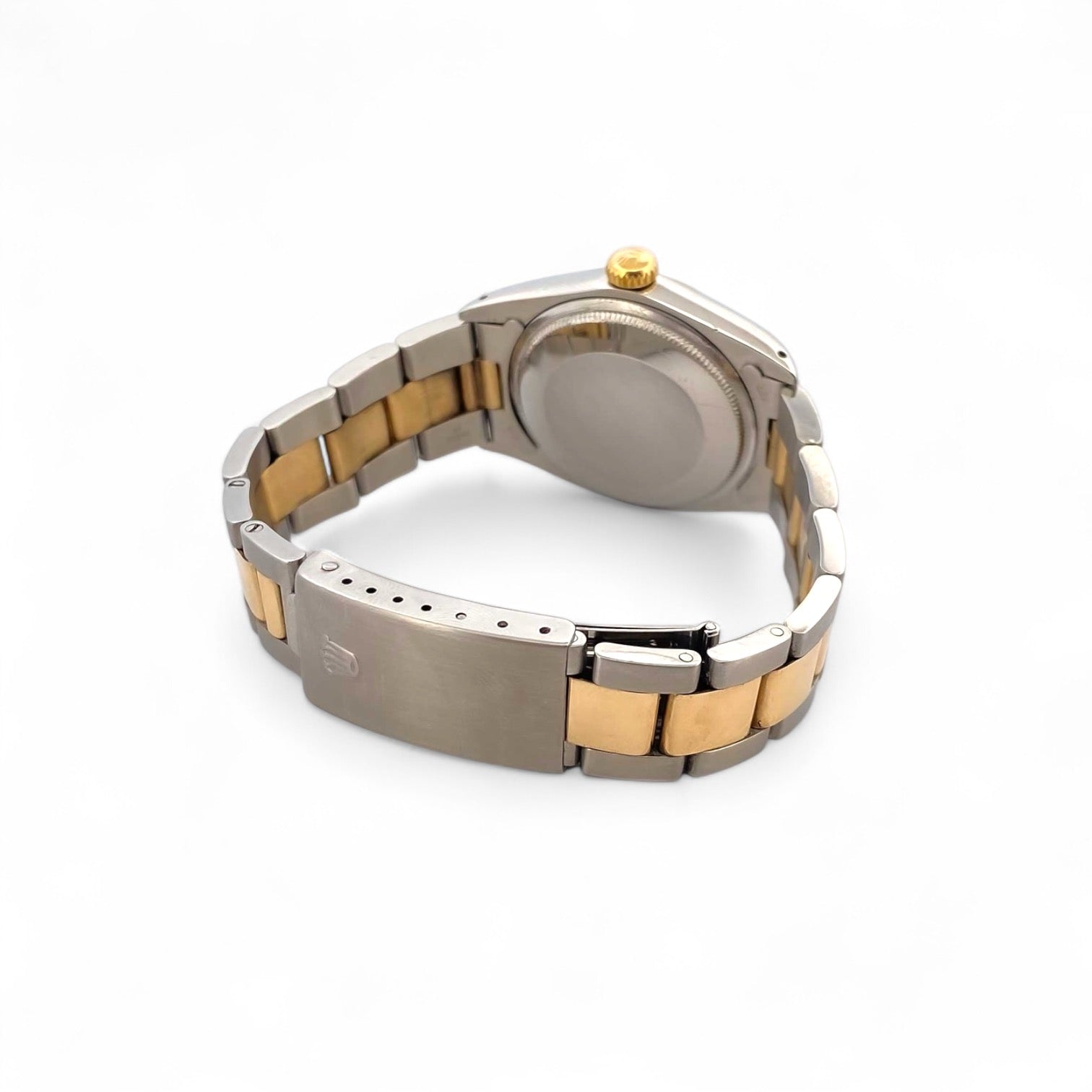 Reloj Rolex Oyster&nbsp; Perpetual Date con esfera de 36mm. Realizado en acero y oro amarillo de 18kt.
Marca: Rolex
Modelo: Oyster Perpetual Date
Año: Finales de los 70 aproximadamente
Caja: 36 mm, acero/oro amarillo
Movimiento: Automático
Pulsera: Acero/Oro amarillo, Oyster cierre desplegabe
Esfera: Champagne, sin cifras
Relojes Rolex de segunda mano baratos en Barcelona. relojes de alta gama al mejor precio.